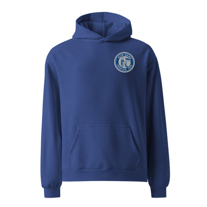 Unisex-Relax-Hoodie in Kobaltblau von Sportswear Iron Monkey 23 mit Fanclub Alte Dame 1892 Logo, vorne sichtbar.